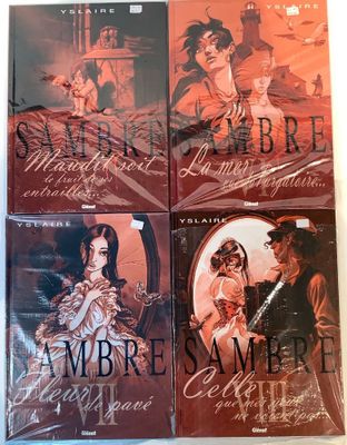 four books of the vampire series are on a table