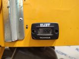 a close up of a clock on a machine