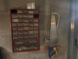 a picture of a garage with tools and tools on the wall