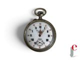 an old pocket watch with roman numerals on it
