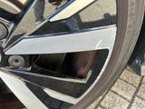 a close up of a wheel on a car