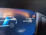 a picture of a view of a car ' s rear view mirror