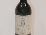 a bottle of wine that is sitting on a table
