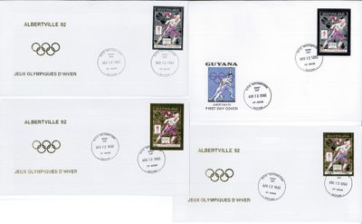 four stamps with olympic symbols on them on a white background