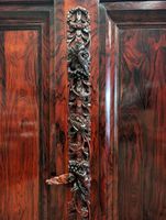Armoire ouvrant par deux portes en placage de palissandre à … (photo 2)