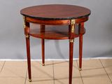 an image of a small table with a marble top