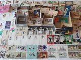 a lot of cards on the table with pictures on them
