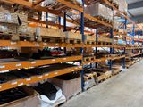 many boxes and boxes on the shelves in the warehouse
