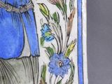 a picture of a woman standing in front of a vase
