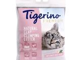 a bag of tigerino cat litter sitting on a white surface
