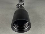 a close up view of a scope scope on a gray surface