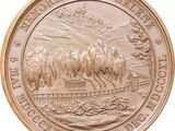 an image of a bronze medal depicting a horse and a bridge
