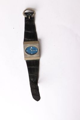 an image of a black watch with a blue face on a white surface