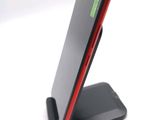 a cell phone that is sitting on a stand