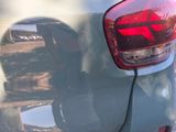 a close up of a car ' s tail light and tail lights
