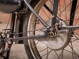a close up view of a bicycle ' s front wheel