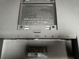 a laptop with a battery in it sitting on top of a table