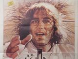L'affiche du film « Danton » est accrochée au mur.
