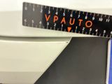 a close up of a measuring tape on a scale