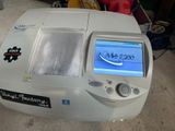 a machine that is sitting on the floor in the room