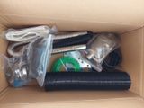 a cardboard box with a bunch of different items inside of it