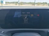 a car dashboard with a digital display on it