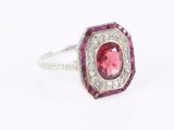 a pink tourmaline and diamond ring set in 18k white gold