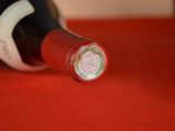 a bottle of wine that is sitting on a table