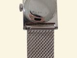 a close up of a watch on a white background