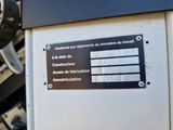 a sign on the side of a building that says construction