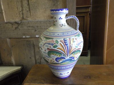 a vase that is sitting on a table in a room