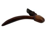 an image of a wooden pipe with a wooden handle on a white background