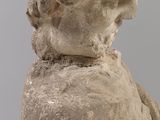 a statue of a man with a hat on his head