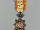 Gros plan sur une médaille portant une étoile