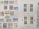 two pages of stamps with pictures of people on them