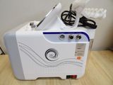 a white machine that is sitting on a wooden table