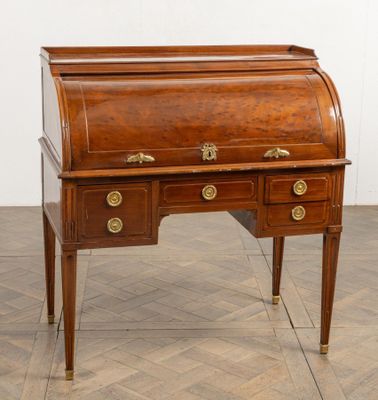 an old wooden desk with two drawers and brass pulls