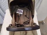 a baby stroller that is sitting on a table