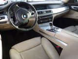 a view of the inside of a car from the driver ' s seat
