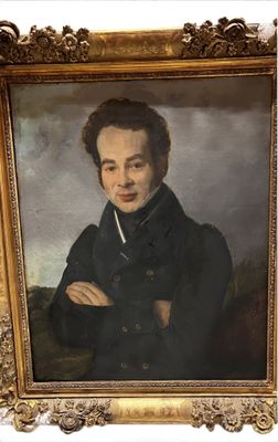tableau représentant un homme avec une cigarette à la bouche, dans un cadre doré