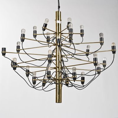 a large brass chandelier with many lights hanging from the ceiling