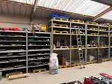 many shelves of tools and tools in a warehouse