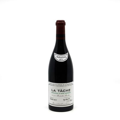 a bottle of wine that is sitting on a table