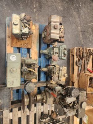 many different types of tools on the wall in this room