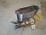 a machine that is sitting on the ground in the garage