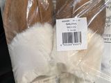 a pair of slippers that are wrapped in plastic