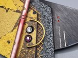 two chopsticks sitting on top of a piece of paper