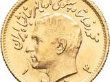 a close up of a gold coin with an image of a man