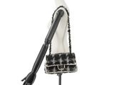 a black and white purse on a mannequin mannequin mannequin mannequin mannequin mannequin mannequin mannequin mann