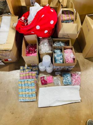 a pile of boxes and other items that are on the floor